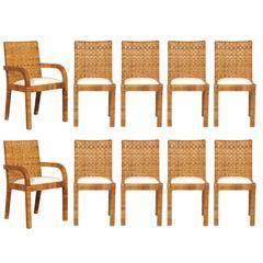 Superb Set of Ten Rattan Wrapped Dining Chairs in the Style of Billy Baldwin