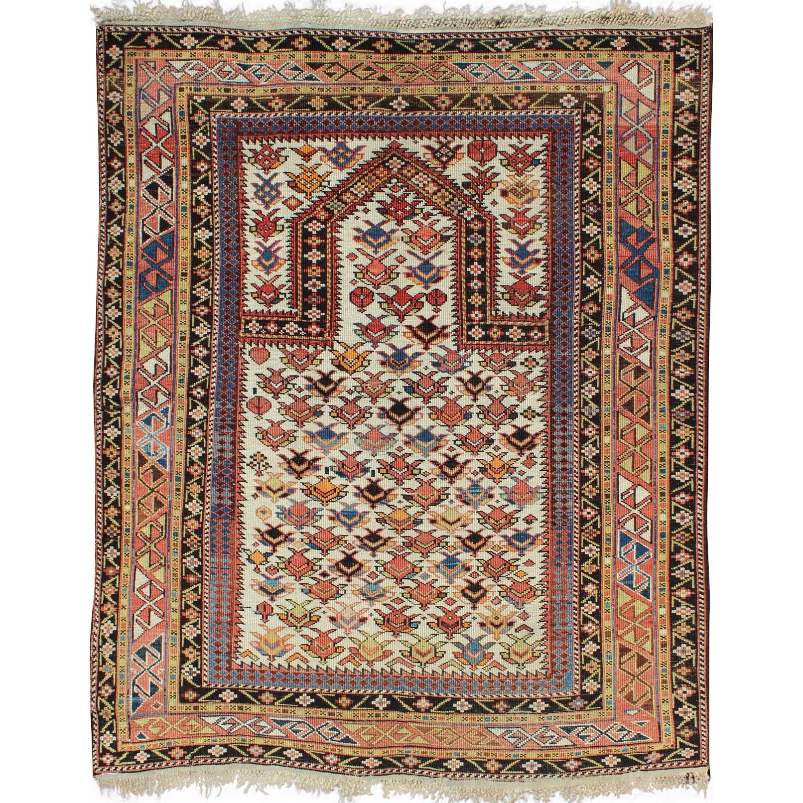 Antique Caucasian Shirvan Rug in Ivory Background, Rust, Yellow, and Dark Brown