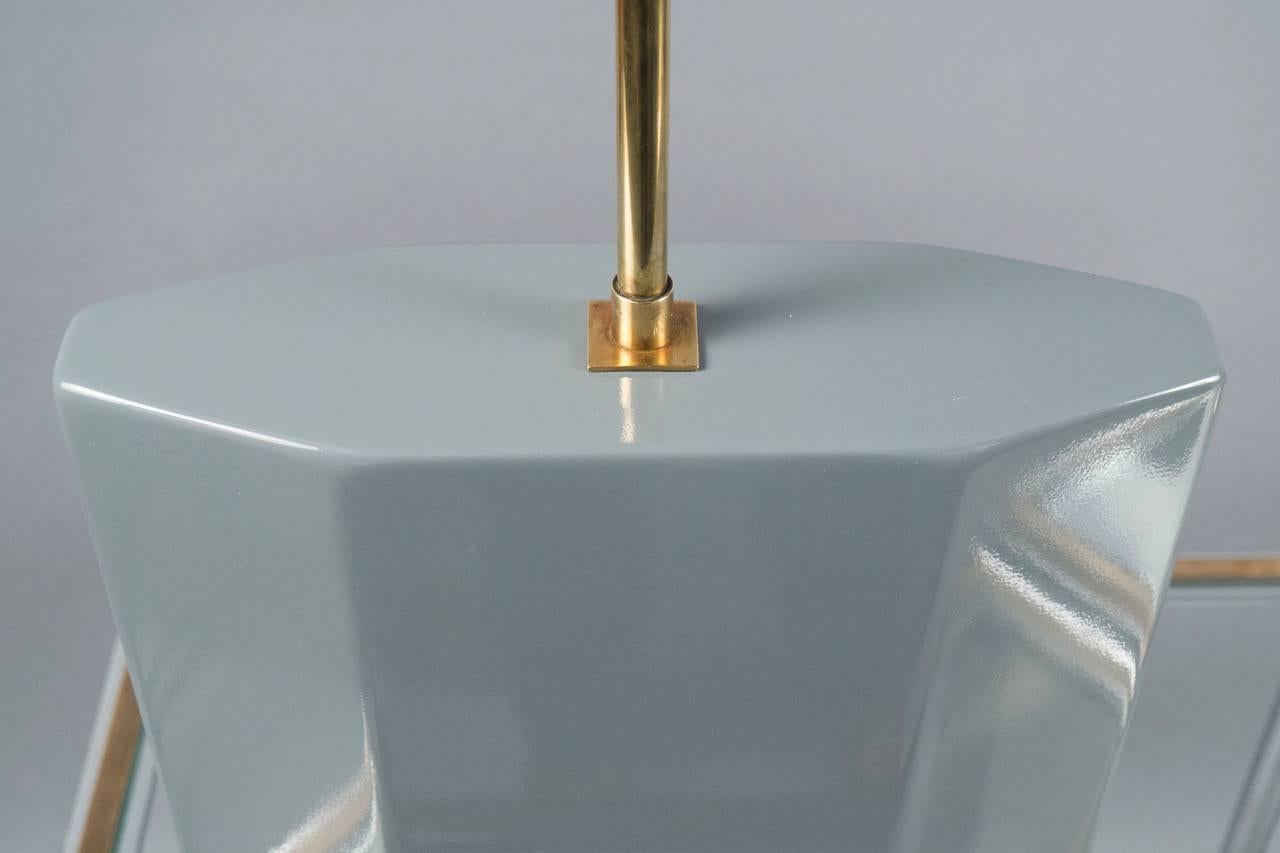 Gray colored lacquered wood lamps on rectangular brass bases. The lacquer is new.
Our N-10565.