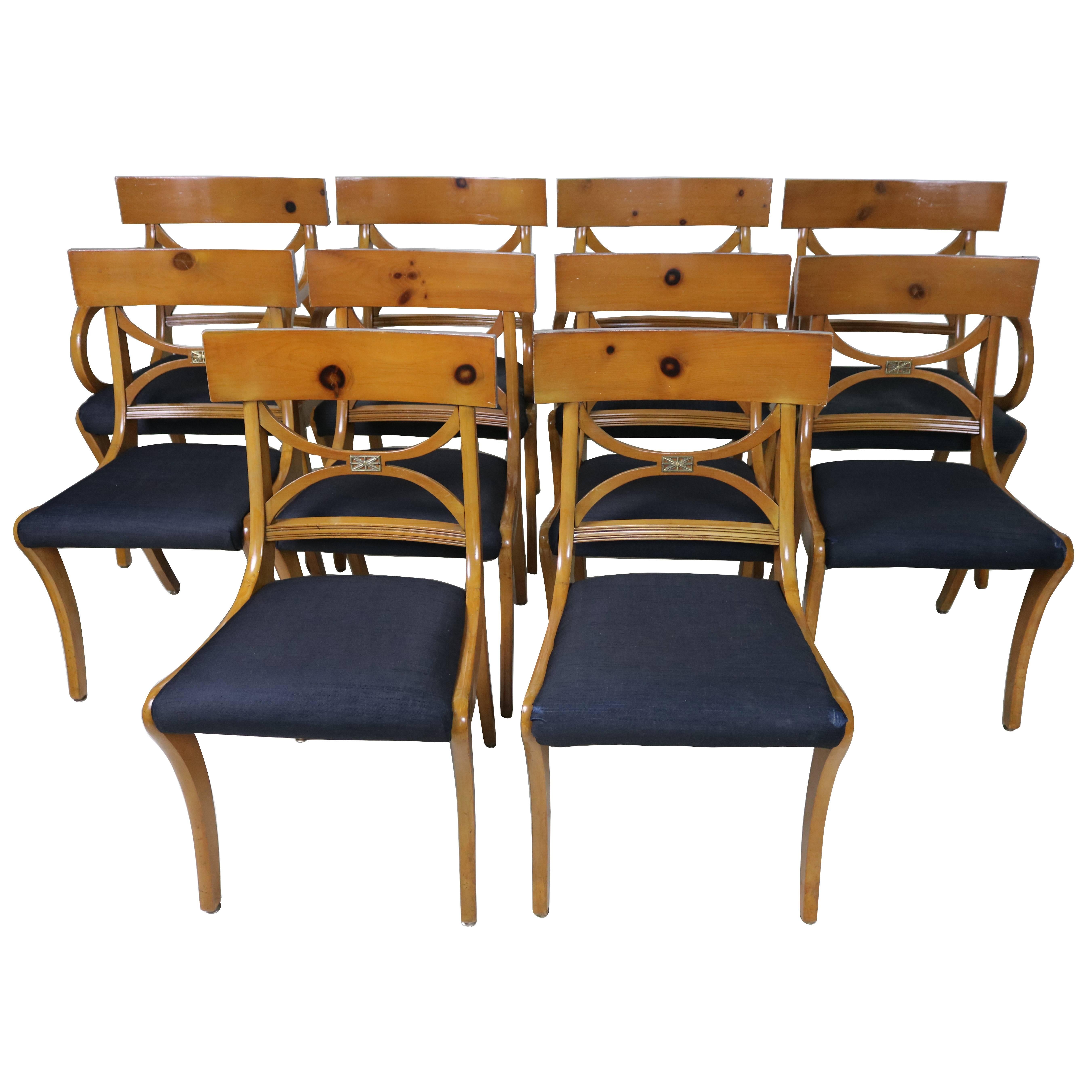 Seating for A Connoisseur!
Spectacular rarely found early 20th century set of ten organic Klismos aged mellow knotty fruitwood dining chairs, newly restored satin lacquered. Elegant lines and high luxe details in the inspired Jacques Emil Ruhlmann