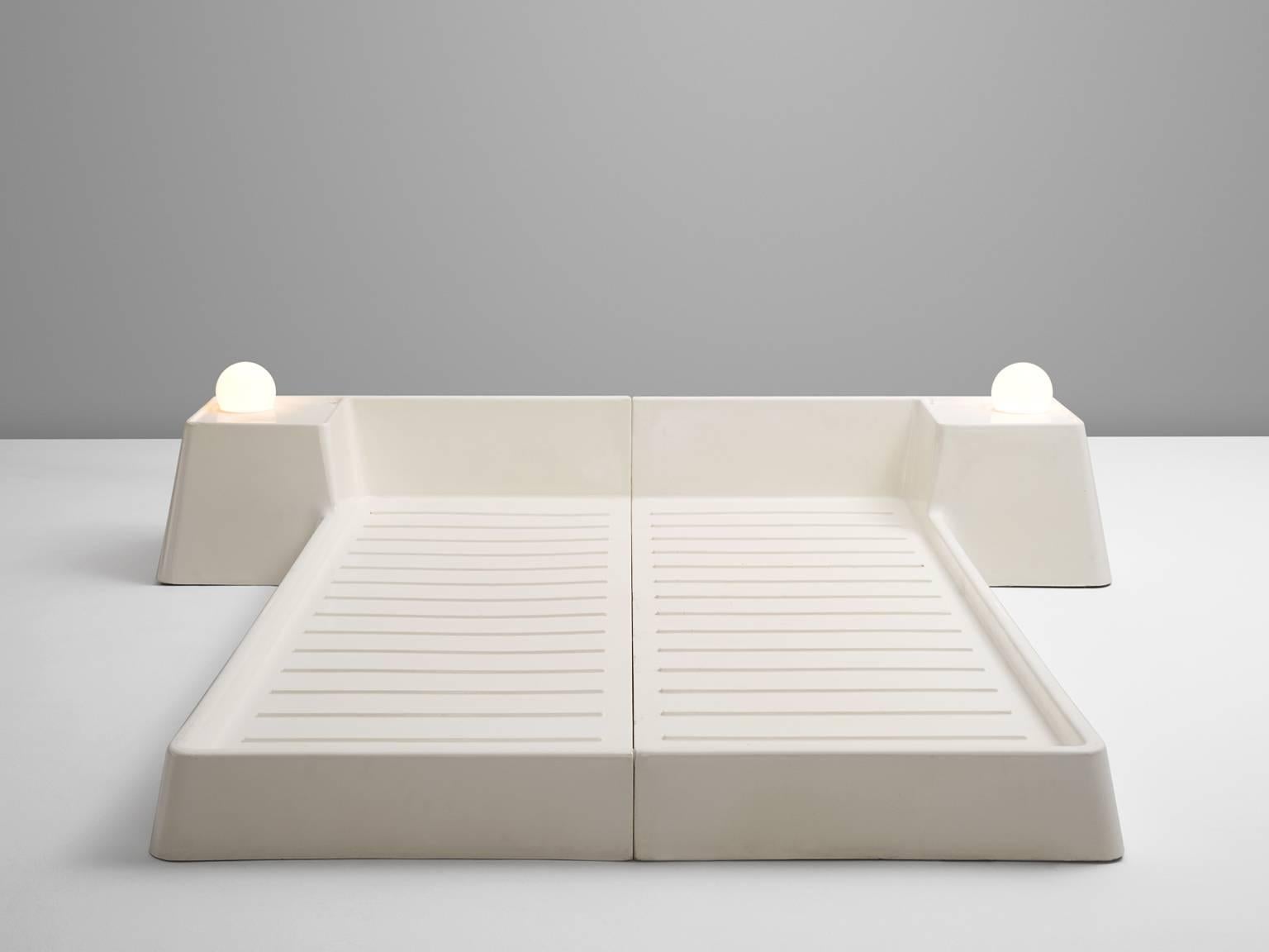 Bedframe, in polyester, by Marc Held for Prisunic, France 1970s. 

White lacquered bed frame designed by French designer Marc Held for Prisunic. 
Frame made of polyester with a white lacquered coating in good original condition. The bed comes