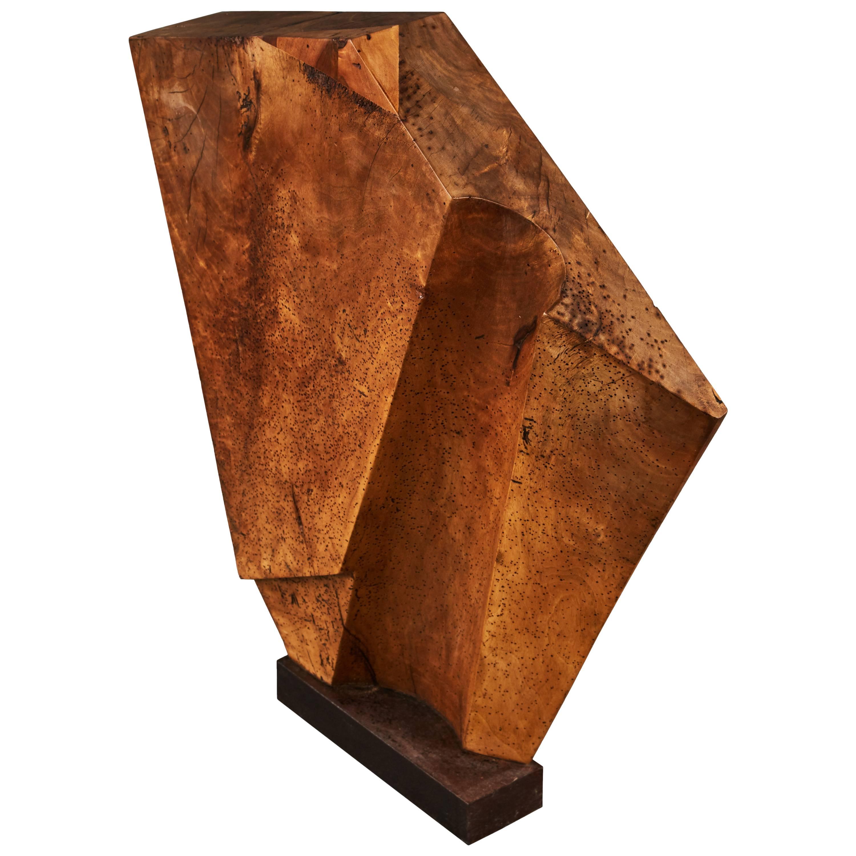 Striking Wood Sculpture Mounted on a Metal Base For Sale