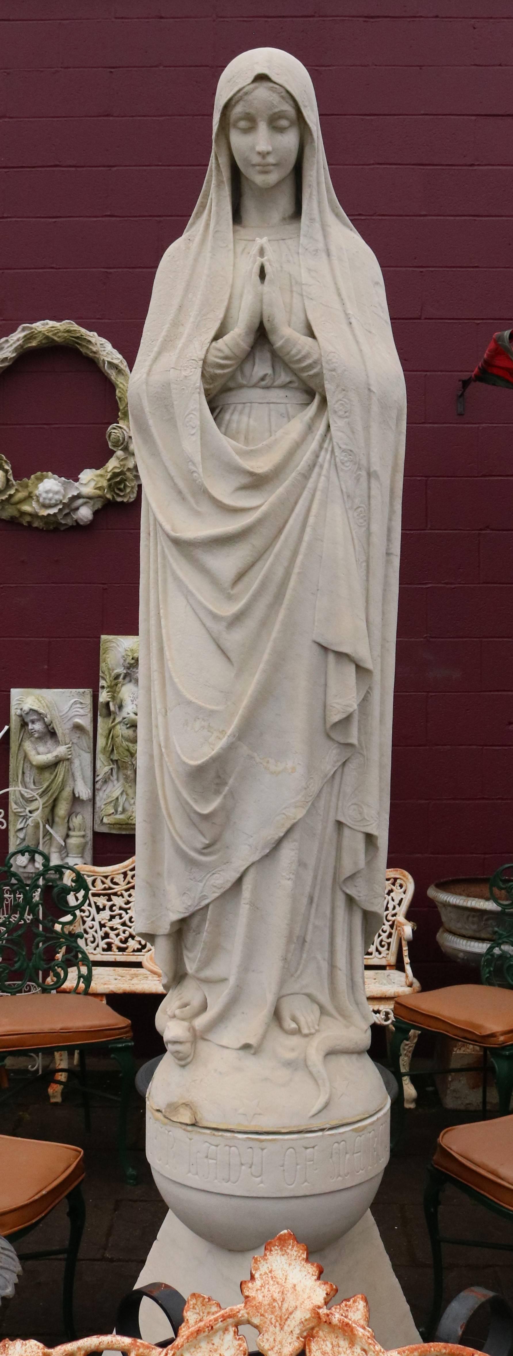 Monumental fine exterior Italian marble statue depicts Mother Mary with serpent with apple under foot, features high detail and incised 
