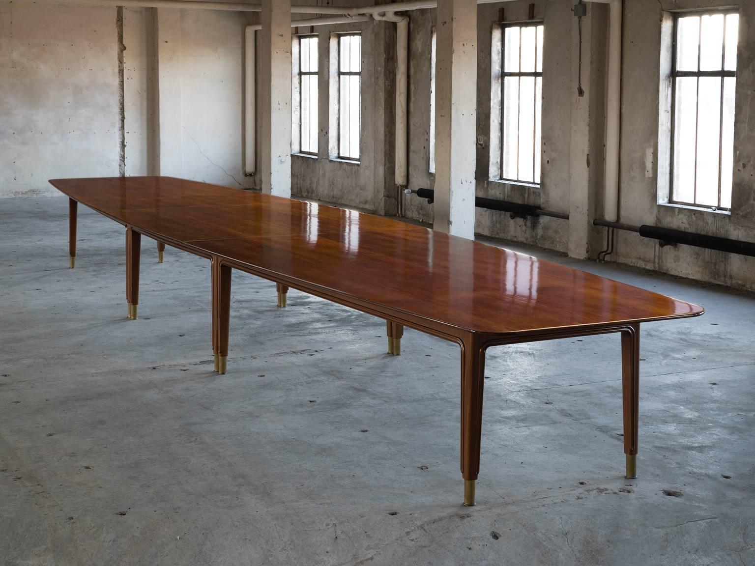 Conference table, in mahogany and brass, Denmark, 1950s.

Unique dining table made for a corporate commission in Denmark. This large table was specially designed and manufactured for the board of a Danish company. The legs are beautifully sculpted