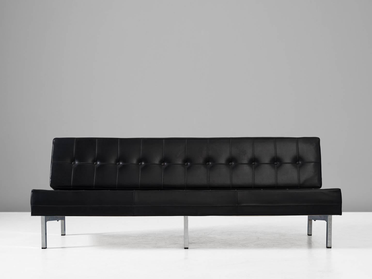 MIM Roma, sofa, black faux leather and metal, Italy, 1960s.

Modern sofa by Italian furniture makers MIM Roma. The steel frame creates an open look an floating appearance of the seating. Upholstered in black leather, the tufted cushions create a