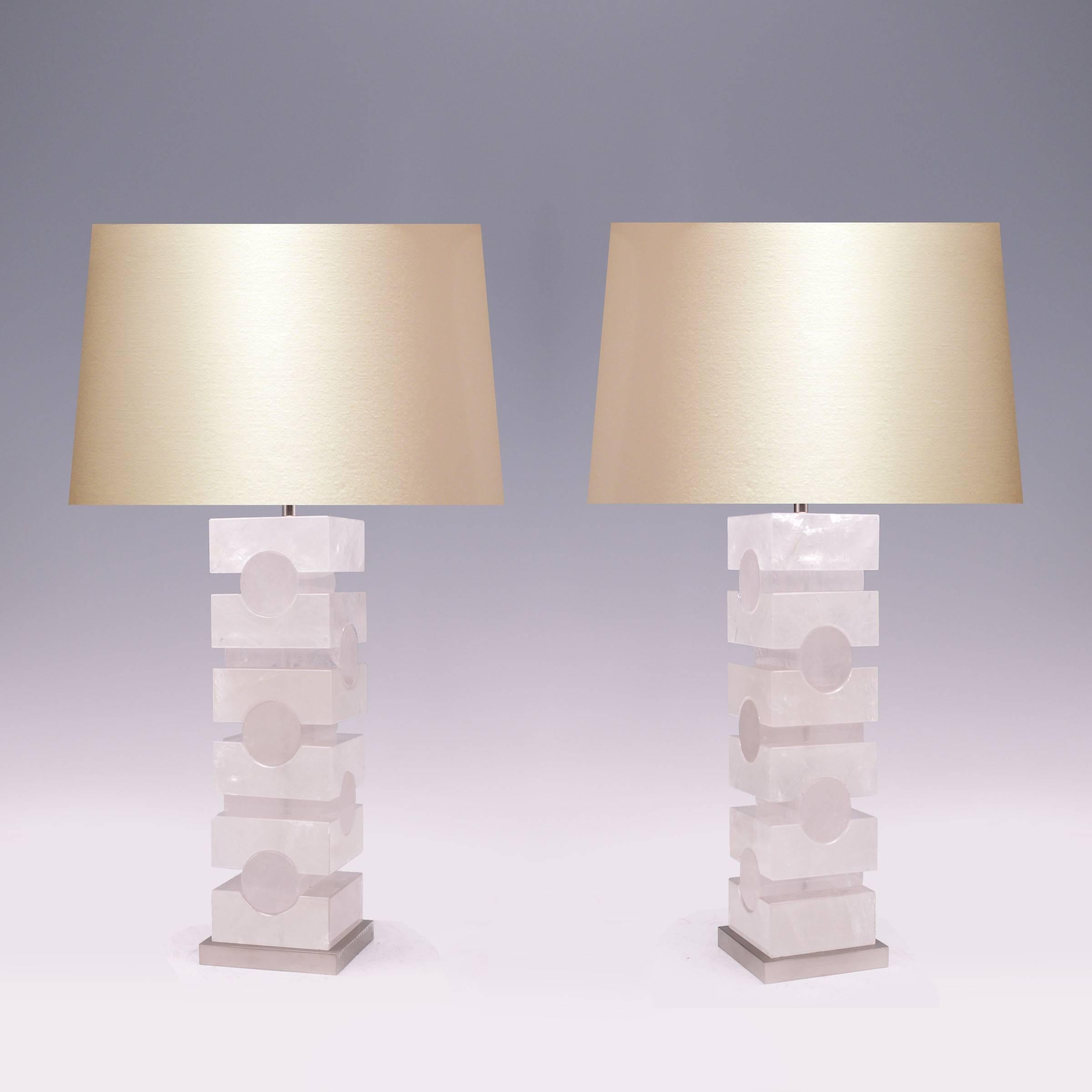 A Fine carved sculptured rock crystal quartz lamp with satin nickel metal base, created by Phoenix Gallery, NYC.
To the rock crystal: 16.25 in / H.
Lampshade not included.