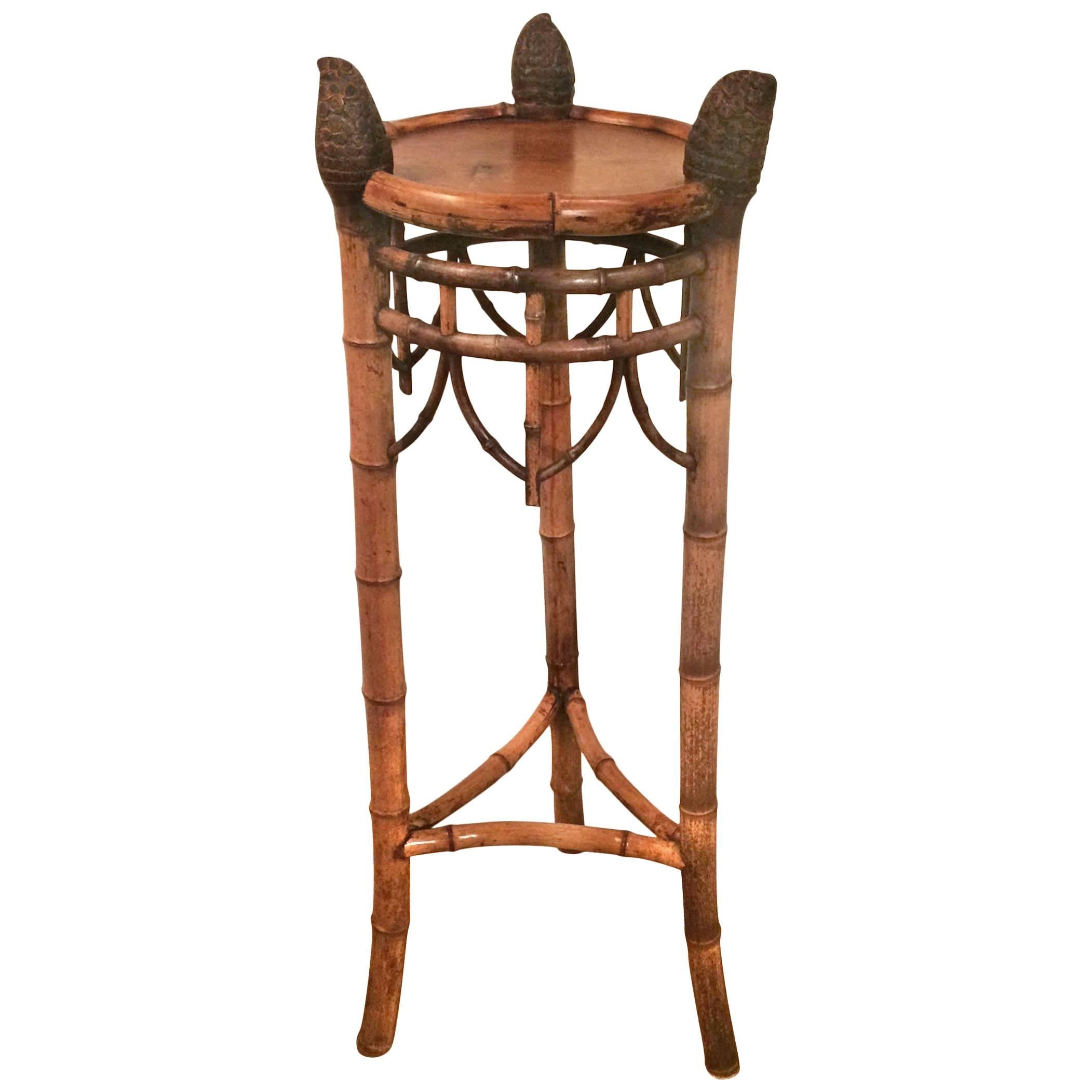 French bamboo plant stand; tripartite base leading up to natural textured finials; attributed to Perret et Vibert; circa 1860.