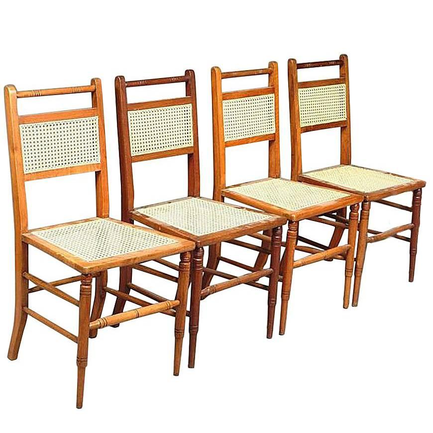 Ensemble de quatre chaises anglo-japonaises à assise en rotin, attribuées à E. W. Godwin