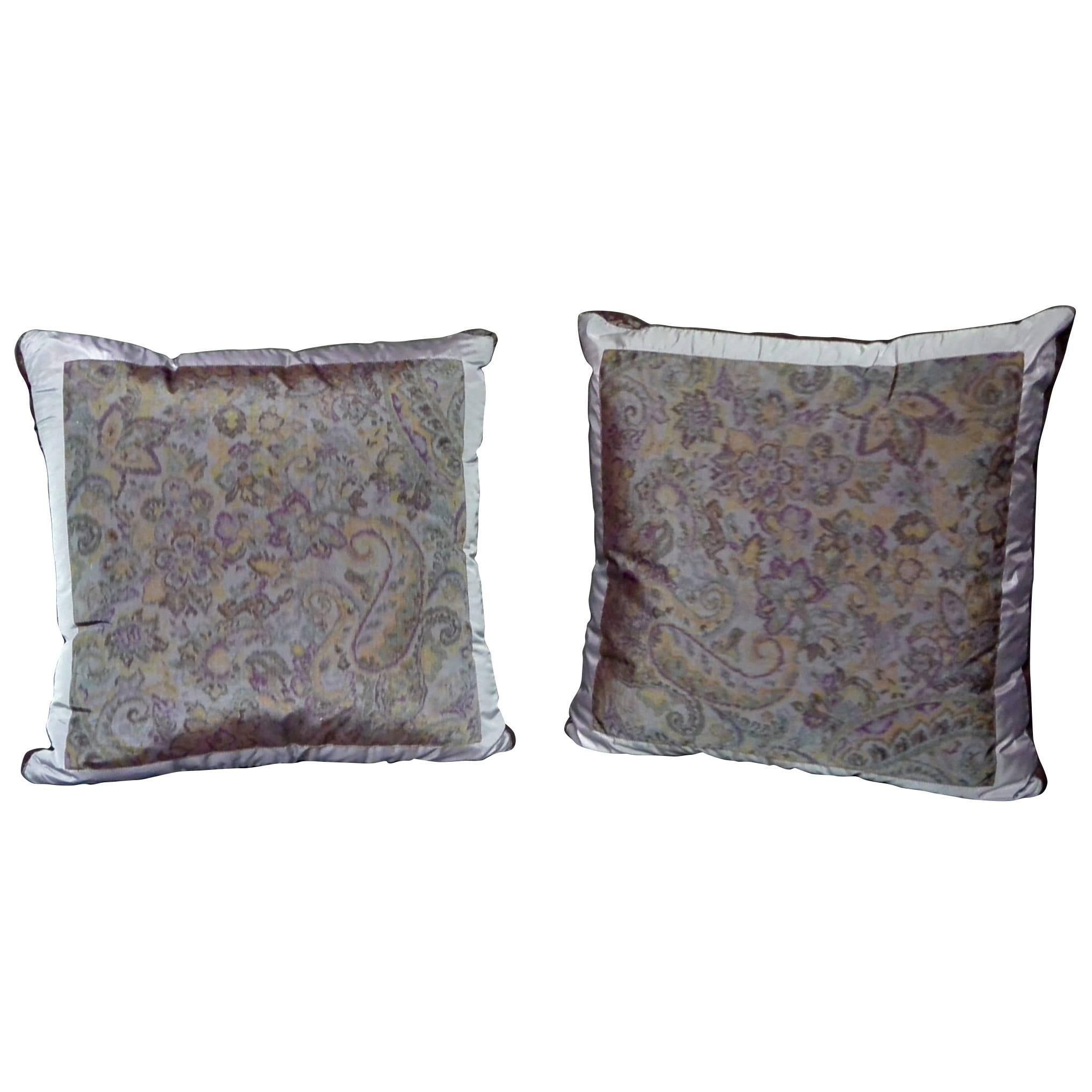 Pair of Etro amethyst silk pillows.  Down and feather pillows with Etro silk center panels and amethyst silk taffeta paneled sides. Italy, 20th Century. 
Dimensions: 19