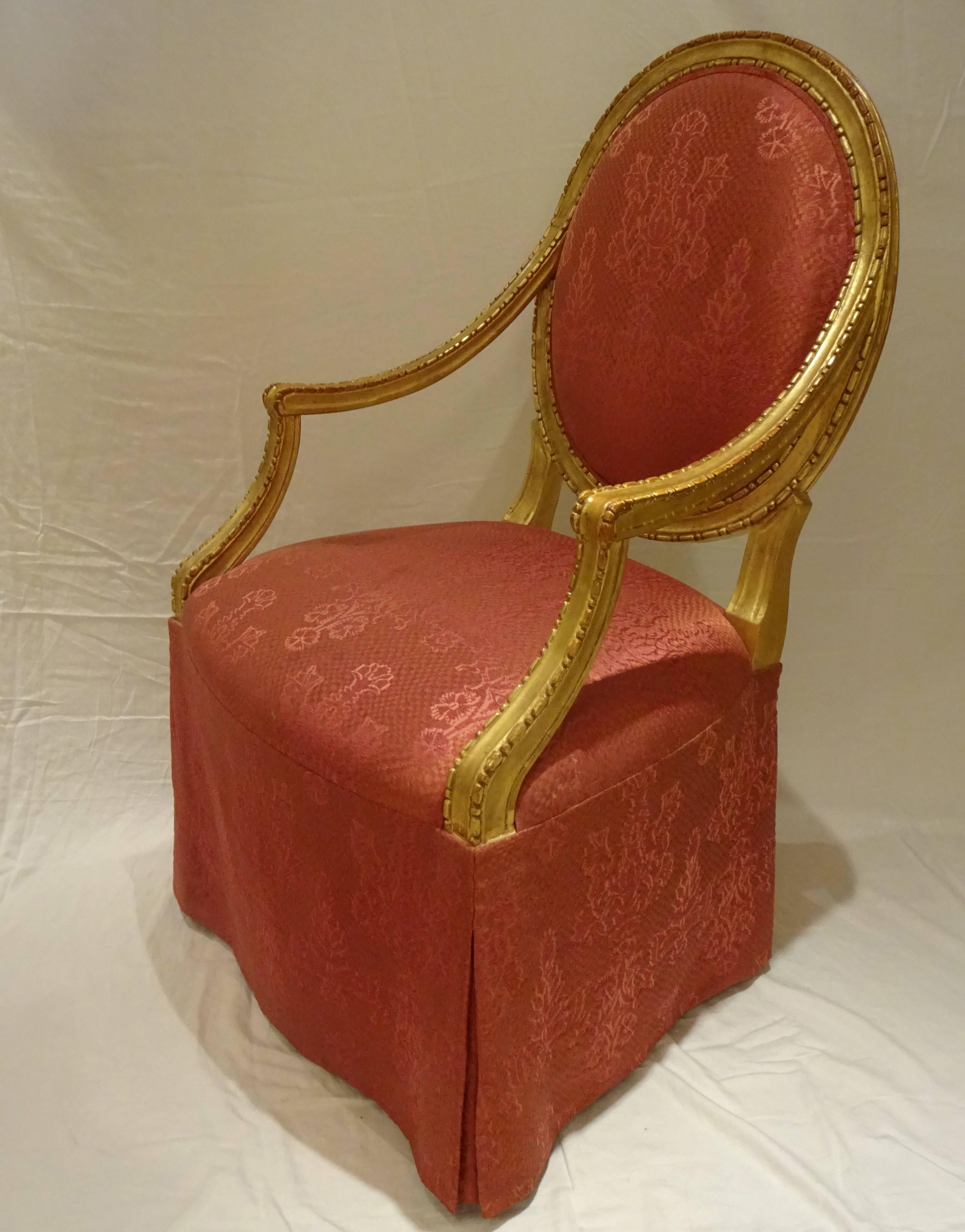 Two chairs and two armchairs.
Can be dining height or living room height.
Armchairs are skirted.
22-karat antique gold leaf,
French, Louis XVI style.
Upholstered in a Bergamo silk.

 