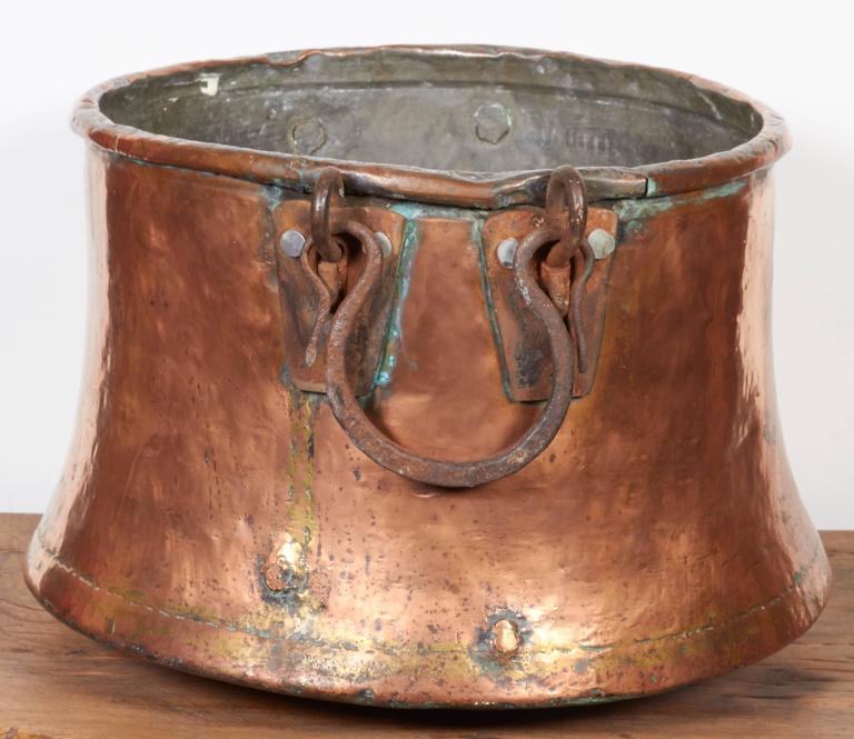 Large Antique Copper Kettle with Flared Base and Heavy Iron Handles For