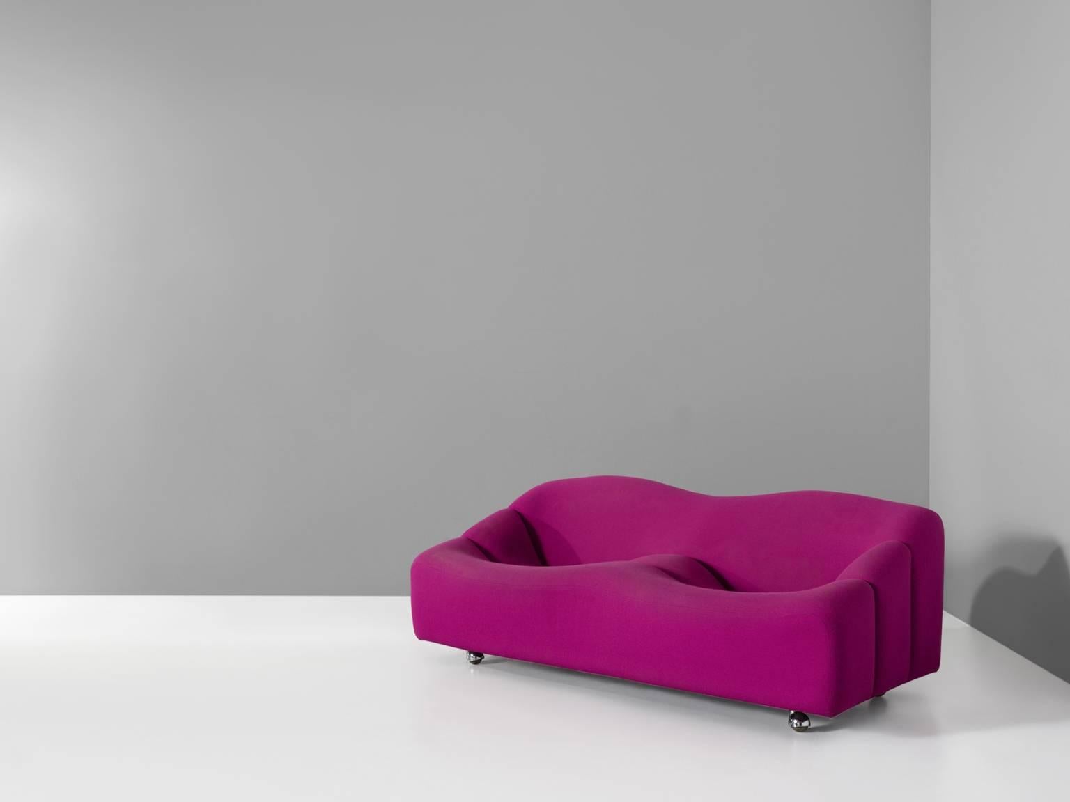 Two-seat sofa from the ABCD series, in fabric, wood and metal, by Pierre Paulin for Artifort, the Netherlands, circa 1968.

Loveseat in fuchsia colored upholstery. The shape of these modular elements reminds of an egg-box. Beautifully curved and