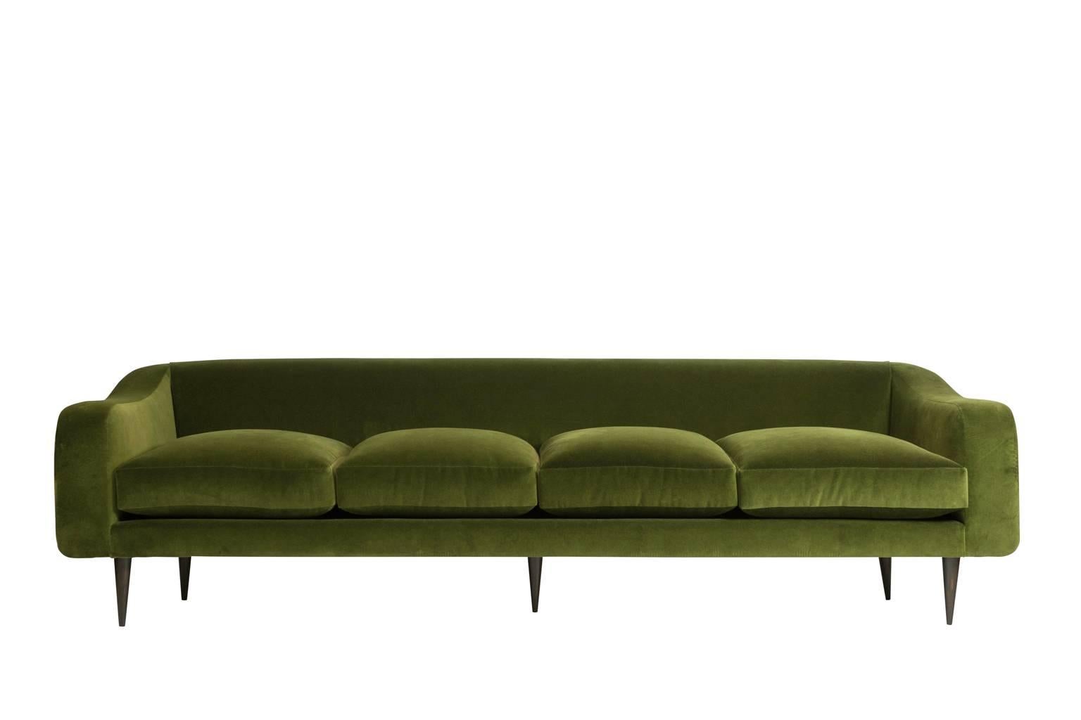 Mid-Century Modern sofa designed by Joaquim Tenreiro. Brazilian rosewood (jacaranda) legs. Newly upholstered in green cotton velvet. Pair of matching armchairs available.