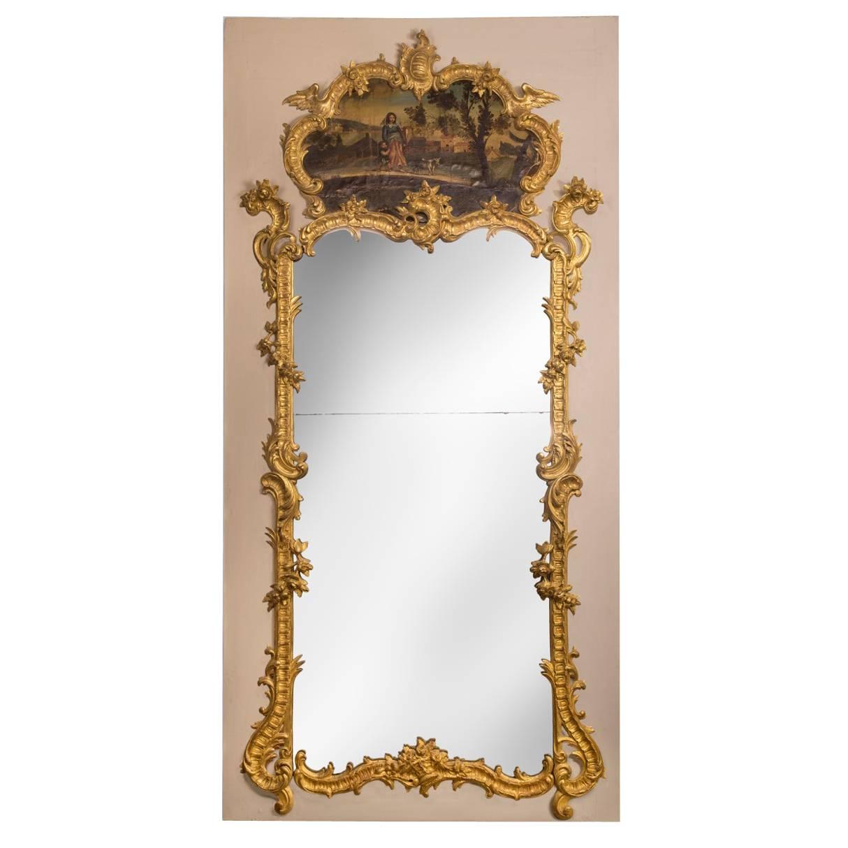 A Large Louis XV Rococo Carved Giltwood Trumeau Mirror