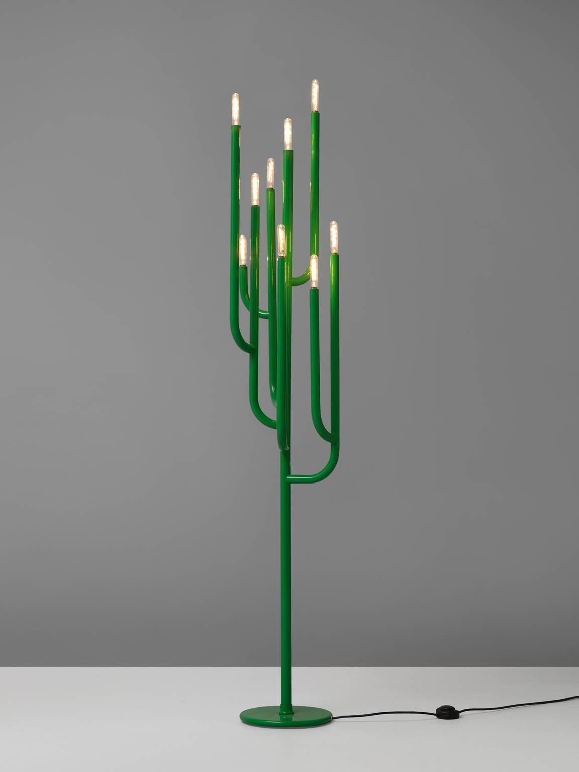 Floor lamp, enameled iron, 1960s, Italy.

Originating in Italy, this Mid-Century Modern, nine-light floor lamp, was designed by Florence Casey in the 1960s. A green enamelled iron tube issues four arms, each extending into one more arm. The arms