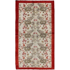 Tapis turc Oushak vintage à motifs floraux ivoire, vert et rouge