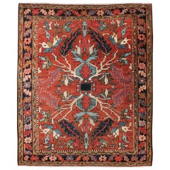 Rustic Handmade Persian Rug With Shades of Red, Light Blue, and Navy