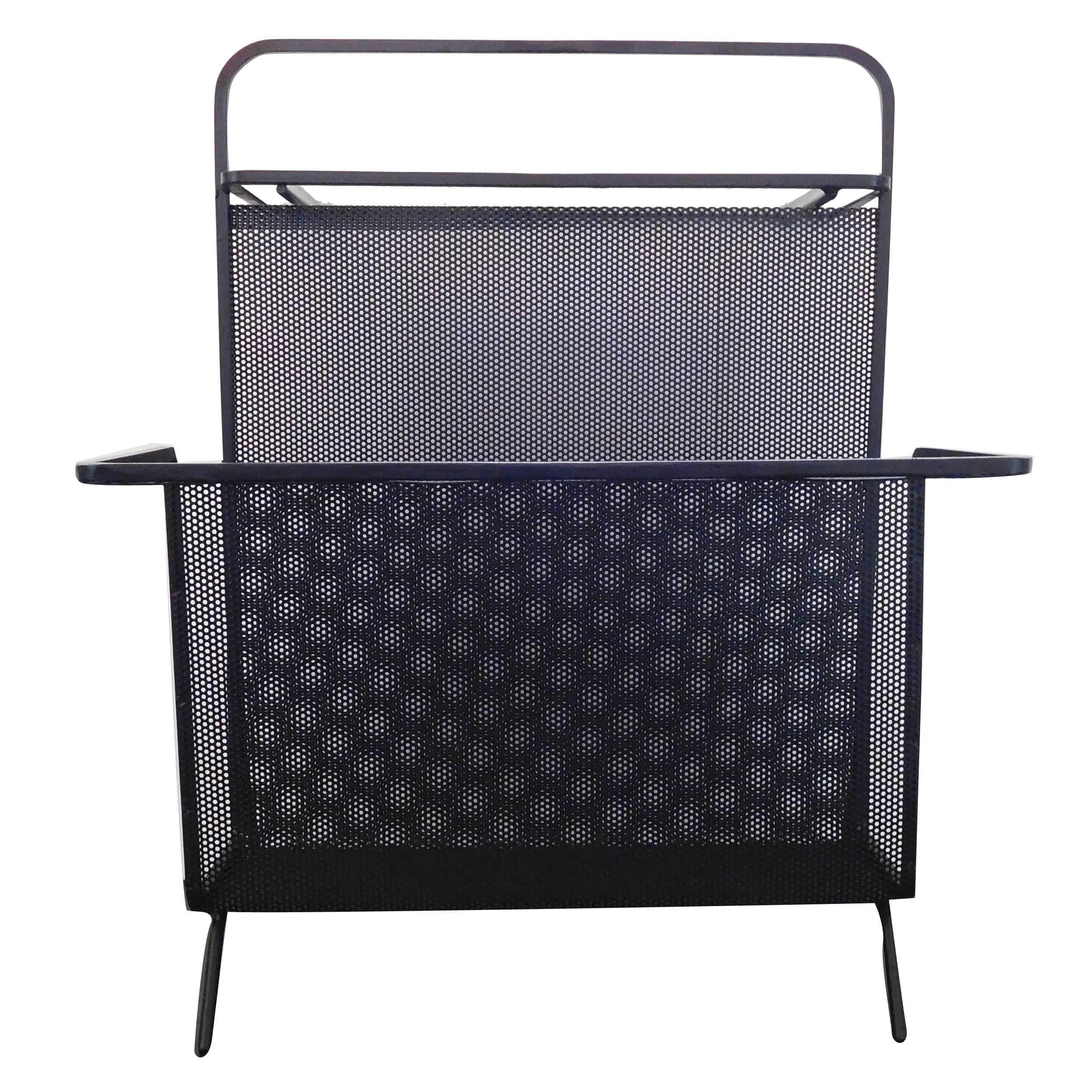 Rare perforated metal and glass magazine rack designed by Mathieu Matégot, circa 1950s, France. Excellent example. 

Reference: Mathieu Matégot, Patrick Favardin, p.14 index illustrations.