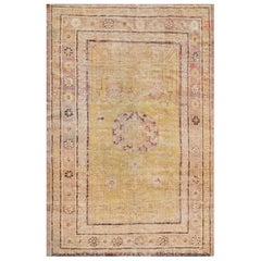 Tapis Khotan de la fin du XIXᵉ siècle provenant du Turkestan oriental