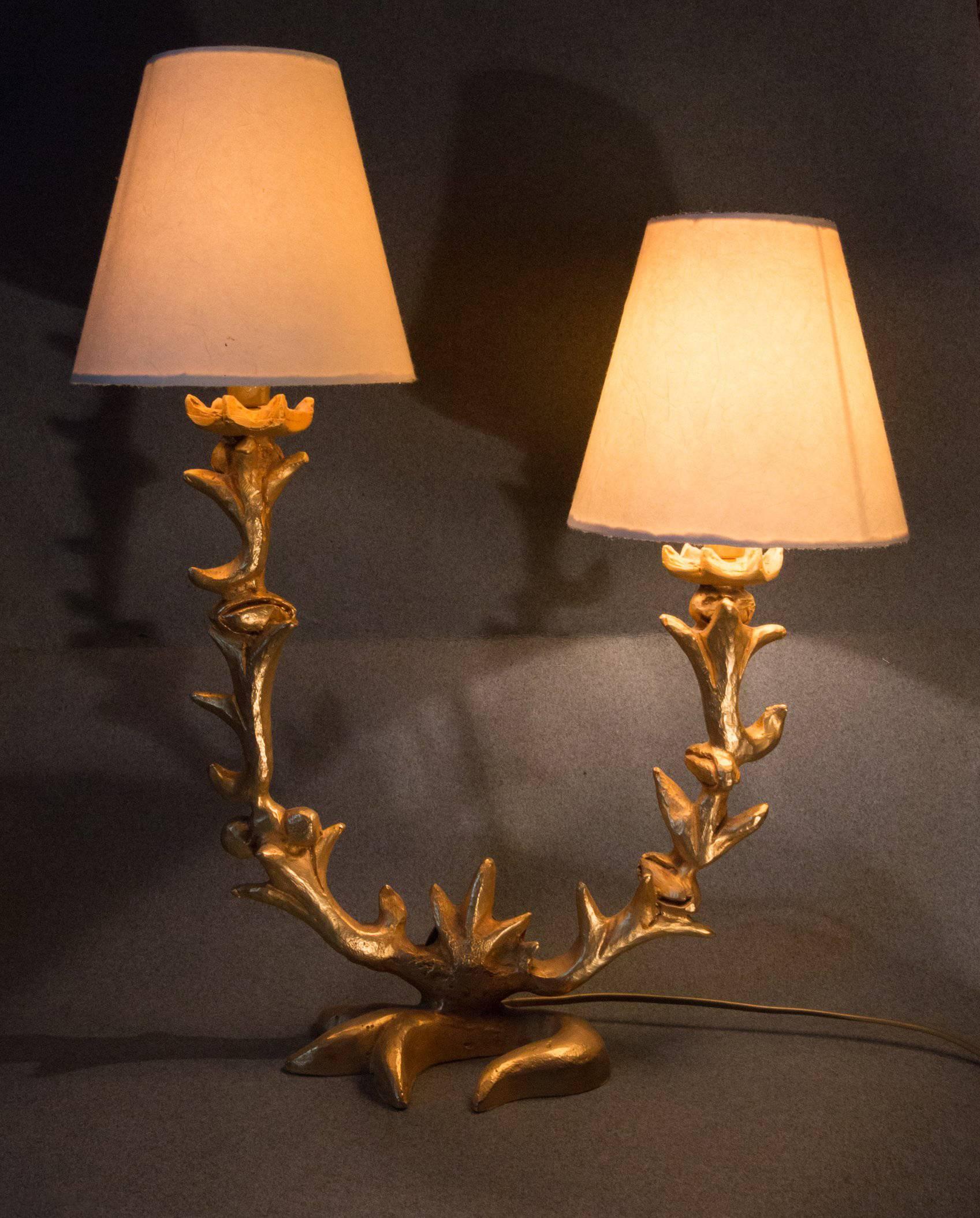 A rare and gorgeous sculptural ormolu table lamp sign by Georges Mathias for Fondica, France in 1995. Our lamp was bought directly to Fondica by us in 1995, it is in a Fine original condition.
The lamp is composed of two asymmetric arm lights.