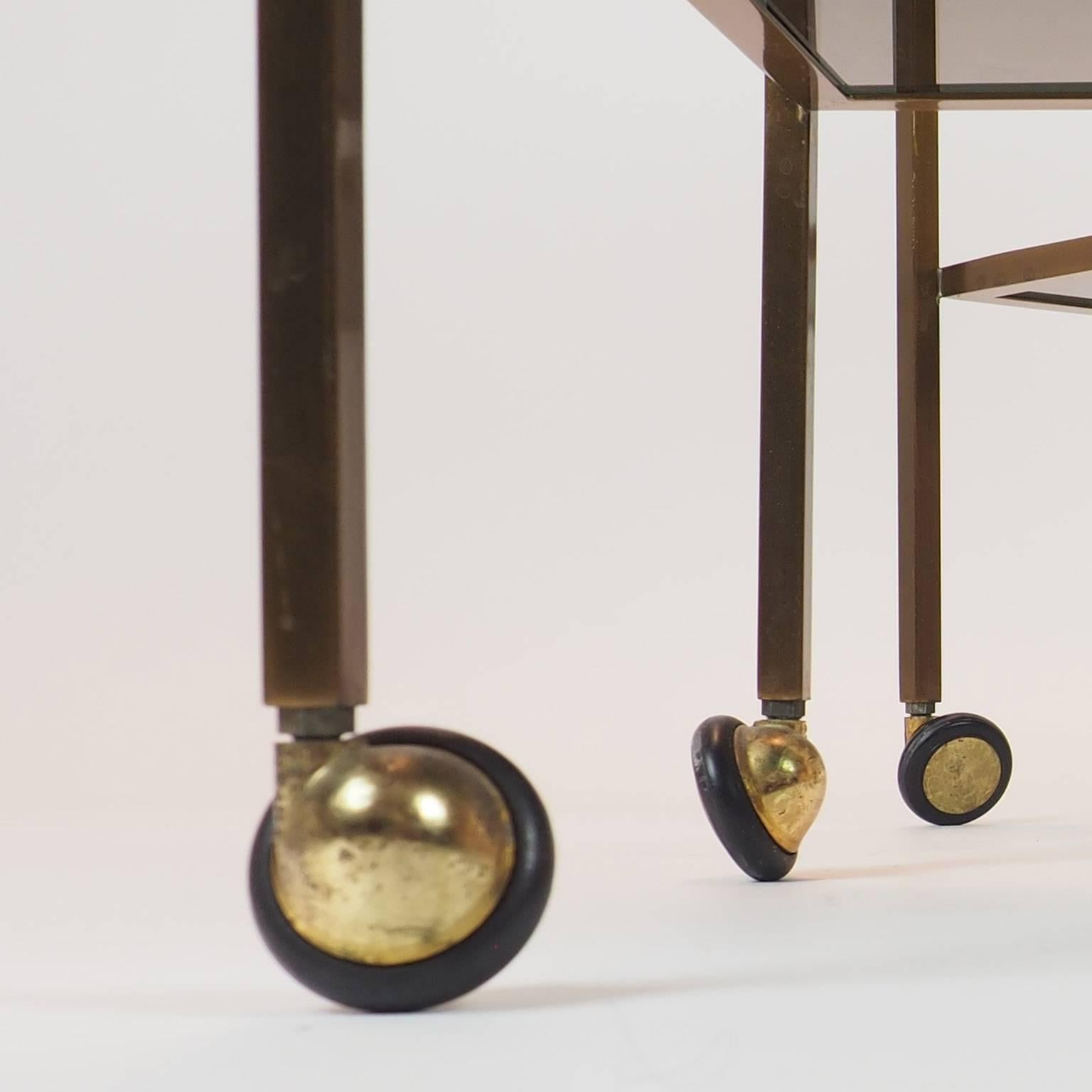  Pair of Nice Italian Brass Side Tables with thick glass and wheels Milano 1960s 6