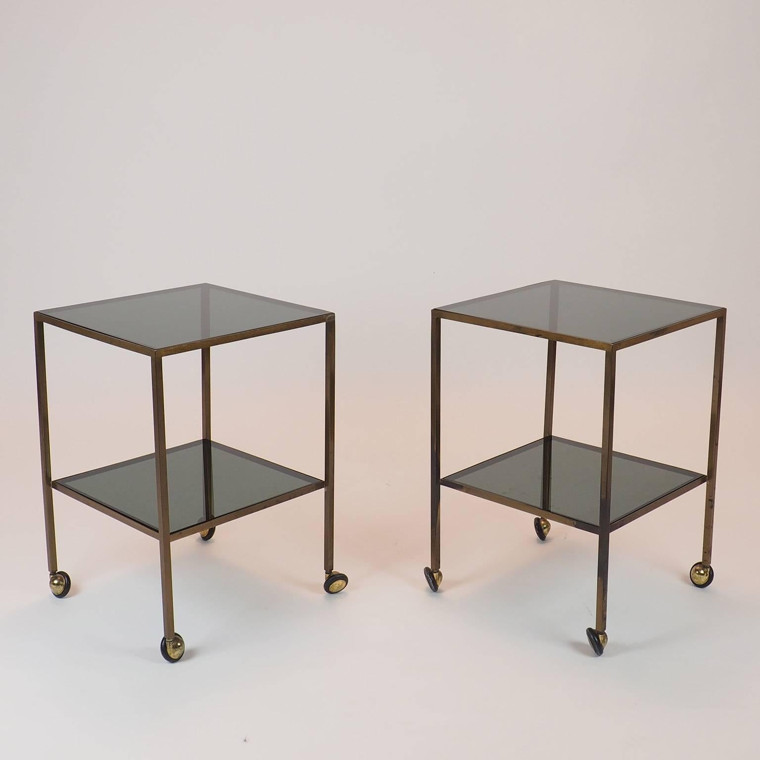 Mid-Century Modern  Pair of Nice Italian Brass Side Tables with thick glass and wheels Milano 1960s