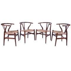 Four Hans J Wegner for Carl Hansen "Wishbone" Dining Chairs Model CH-24-Oak