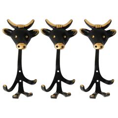 Three Bull Coat Wall Hooks Blackened Brass by Walter Bosse, Austria, 1950s