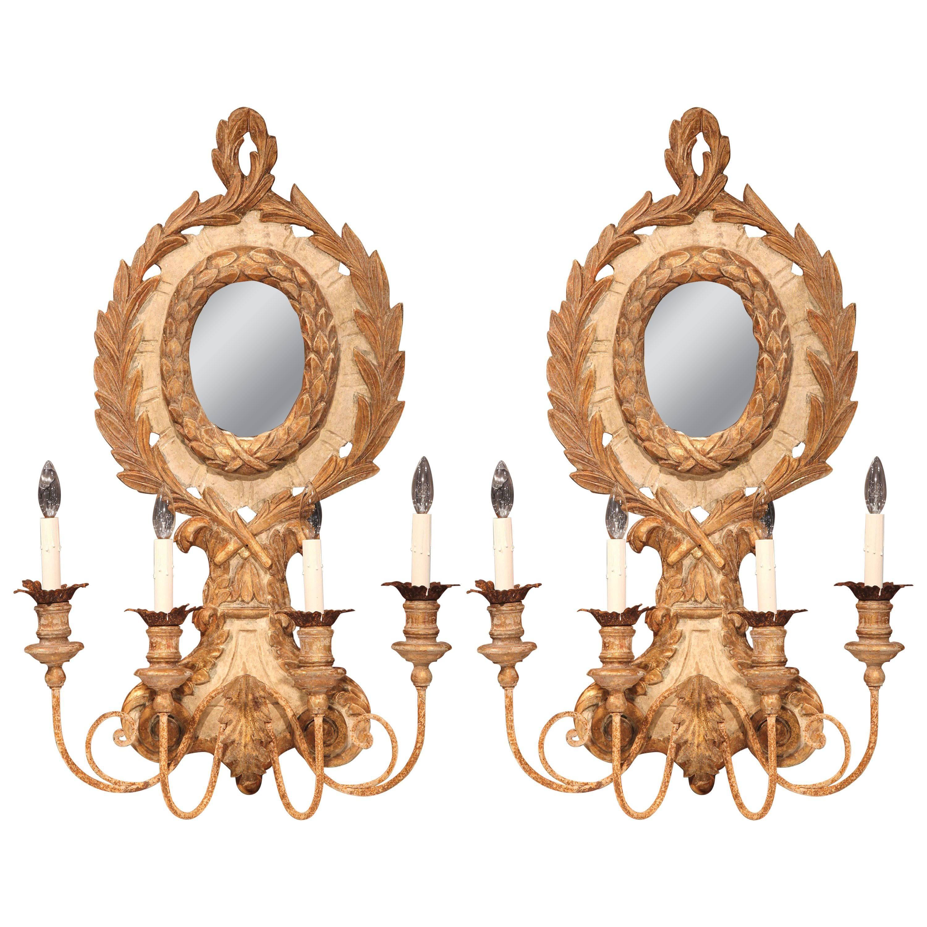 Pair of Italian Carved Giltwood and Iron Painted Four-Light Sconces