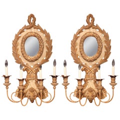 Vintage Pair of Italian Carved Giltwood and Iron Painted Four-Light Sconces