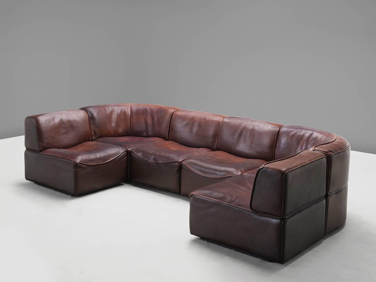 Sectional sofa model DS-15, in leather by De Sede, Switzerland, 1970s. 

This sectional sofa contains two corner elements, four normal elements. The section make it possible to arrange this sofa to your own wishes. The design is simplistic yet