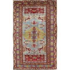Antiker türkischer Oushak-Teppich mit lebhafter Farbpalette und Medaillon-Design