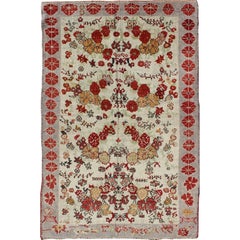 Türkischer Oushak-Teppich im Vintage-Stil mit All-Over-Blumenmuster und Boteh-Rand