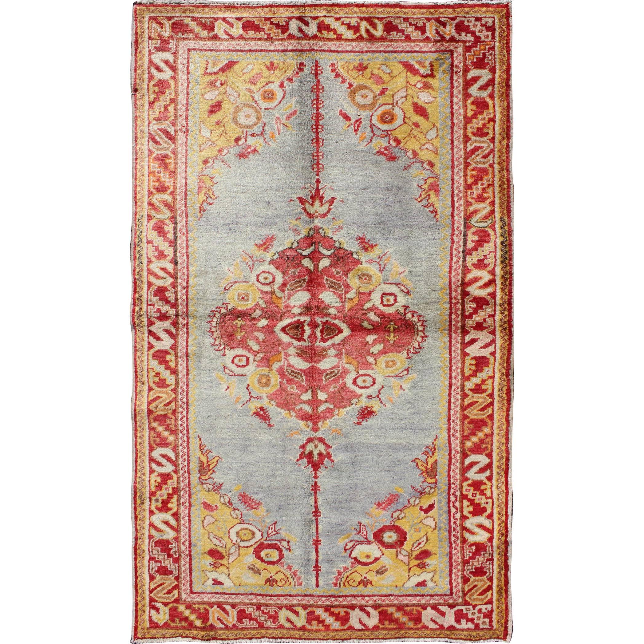 Vintage Turkish Oushak Rug with Floral Medallion & Cornices on Light Gray Field