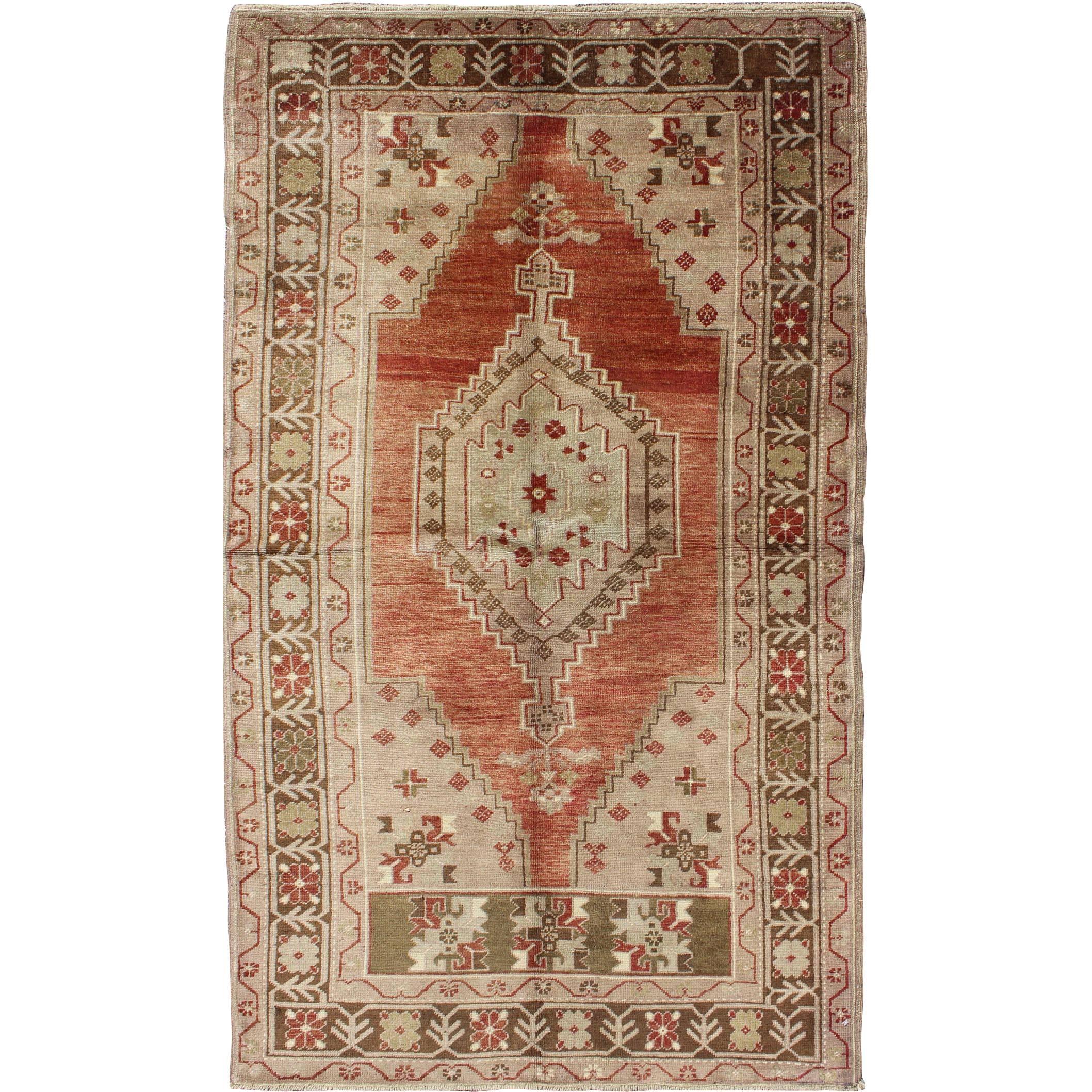 Vintage Oushak Rug With Geometric Motifs in Terracotta, Green and Tan For Sale