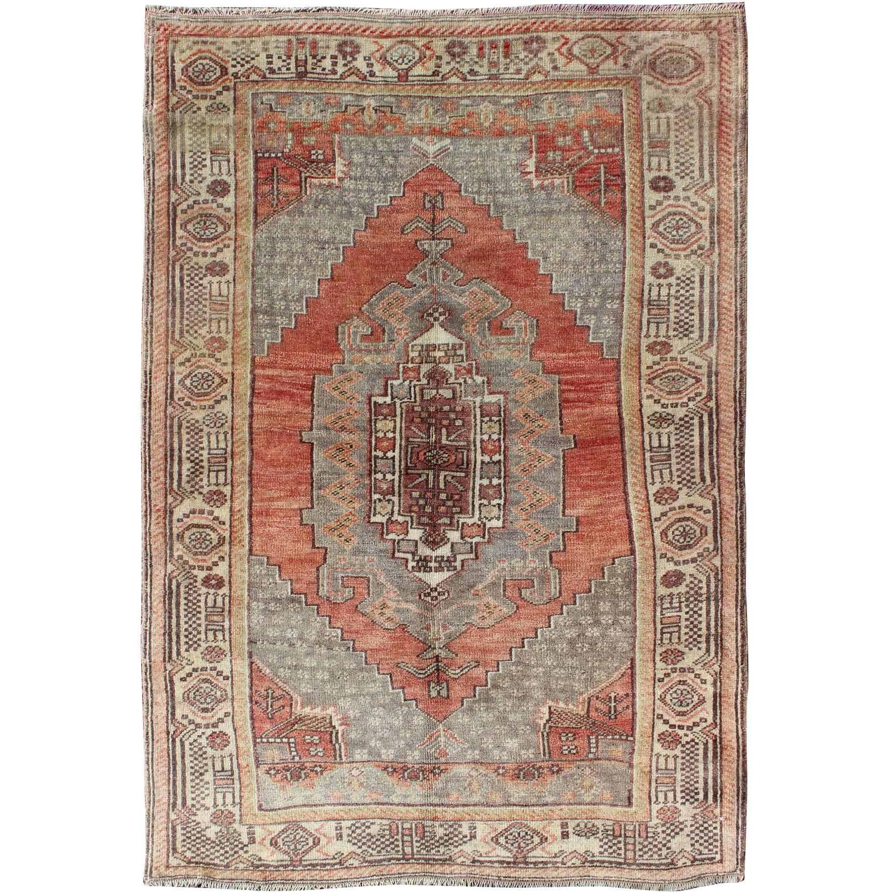 Vintage Turkish Oushak Rug with Geometric-Tribal Motifs in Red-orange and Gray