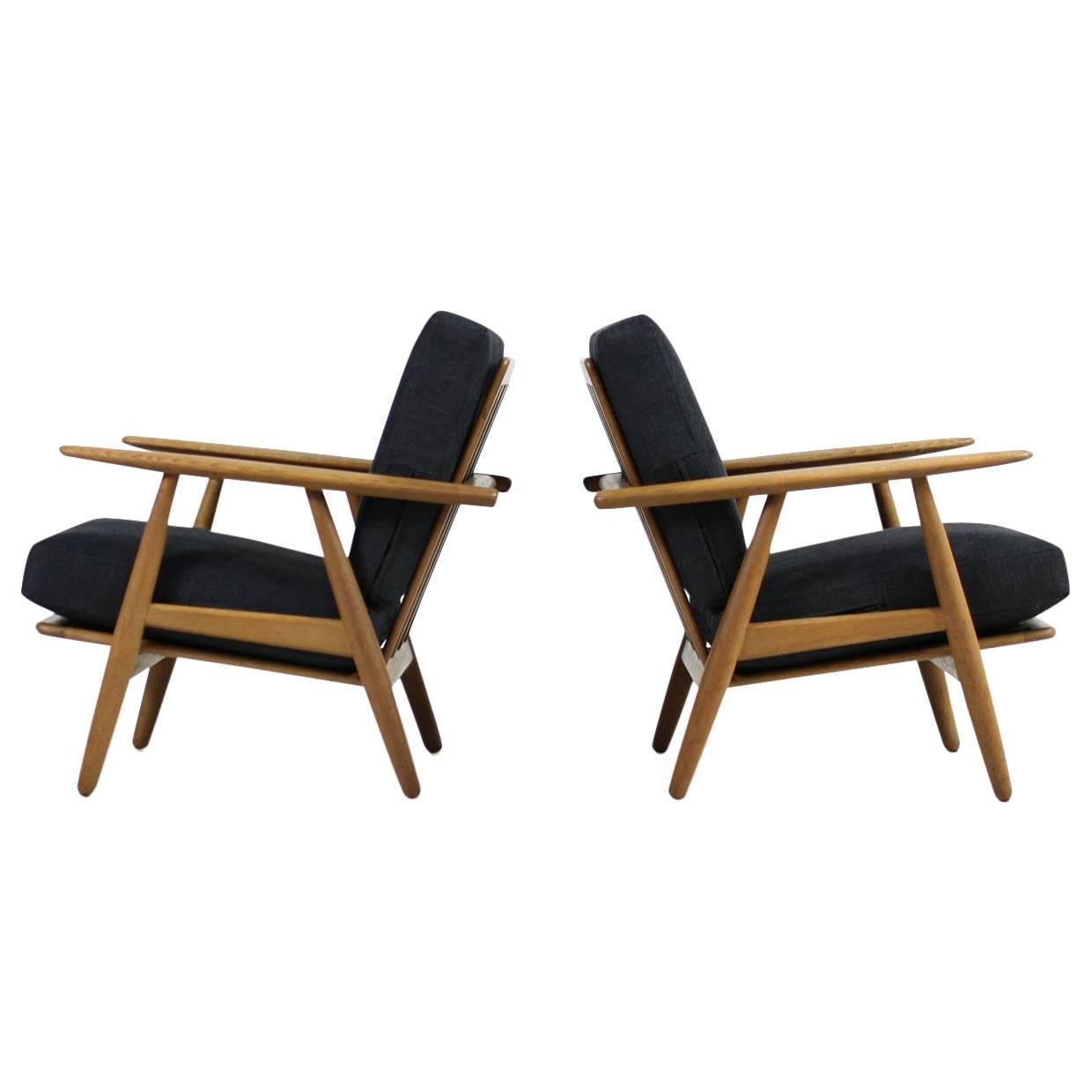 Beautiful 1950s Hans J. Wegner GE 240 Oak Cigar Easy Lounge Chairs 
Ottoman