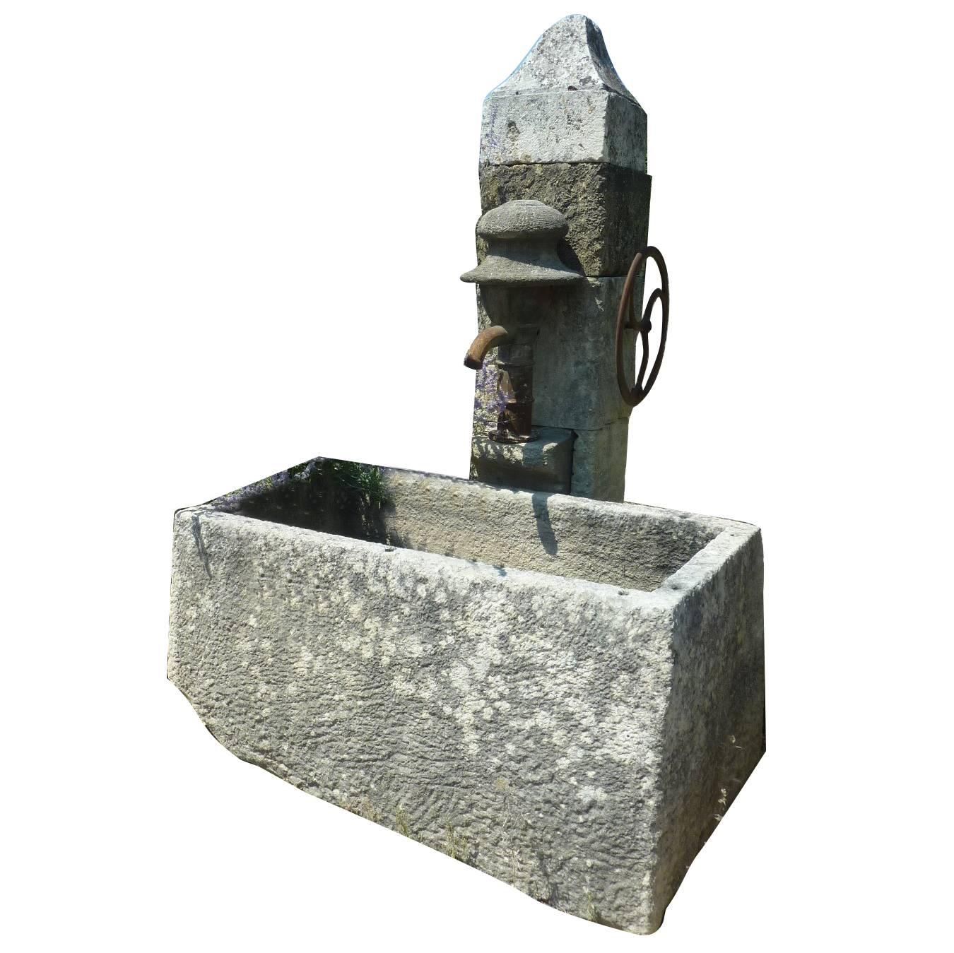 Antique Wall-Fountain with Ancient Manual Water Pump and Monolith Stone Basin For Sale
