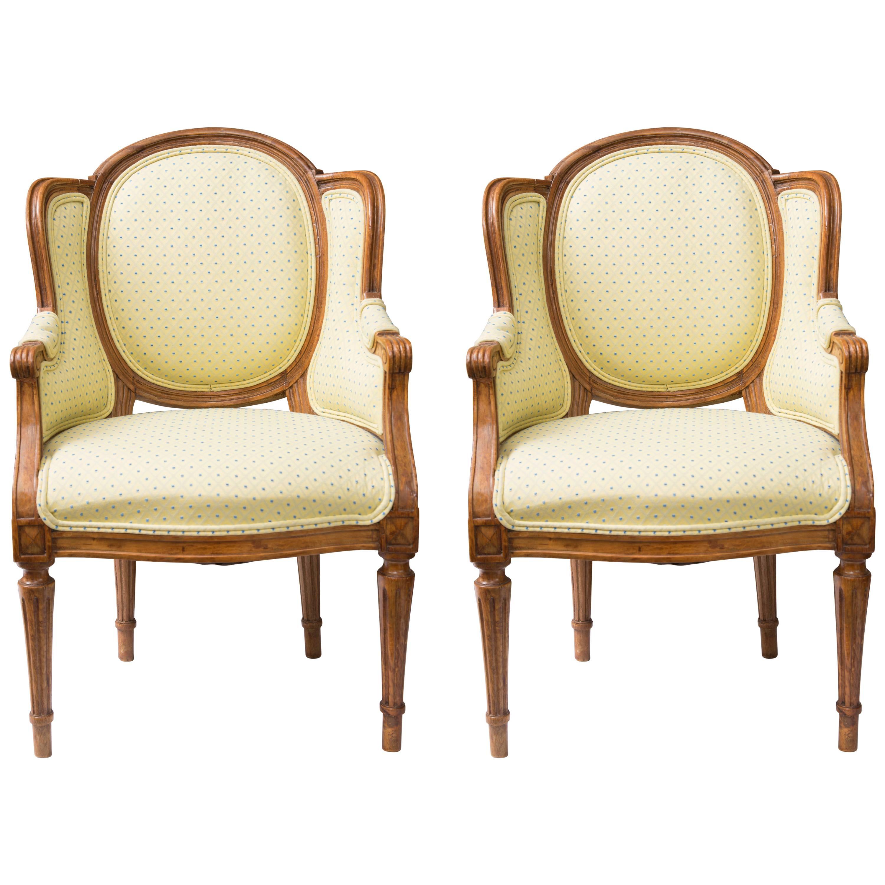 Pair of Diminutive Louis XVI Beechwood Wing Chairs