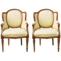 Pair of Diminutive Louis XVI Beechwood Wing Chairs