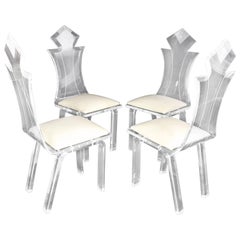 Set of Four Carved Bent Lucite Dining Chairs