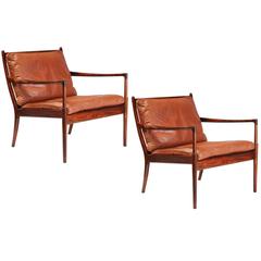 Pair of Ib Kofod-Larsen 'Samso' Rosewood Lounge Chairs, circa 1960s