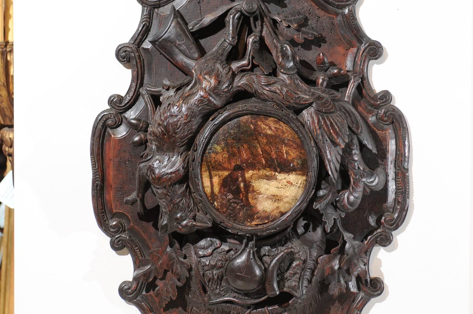 German Black Forest Carved Wood Plaque with Painted Scene of the Hunt and Trophies