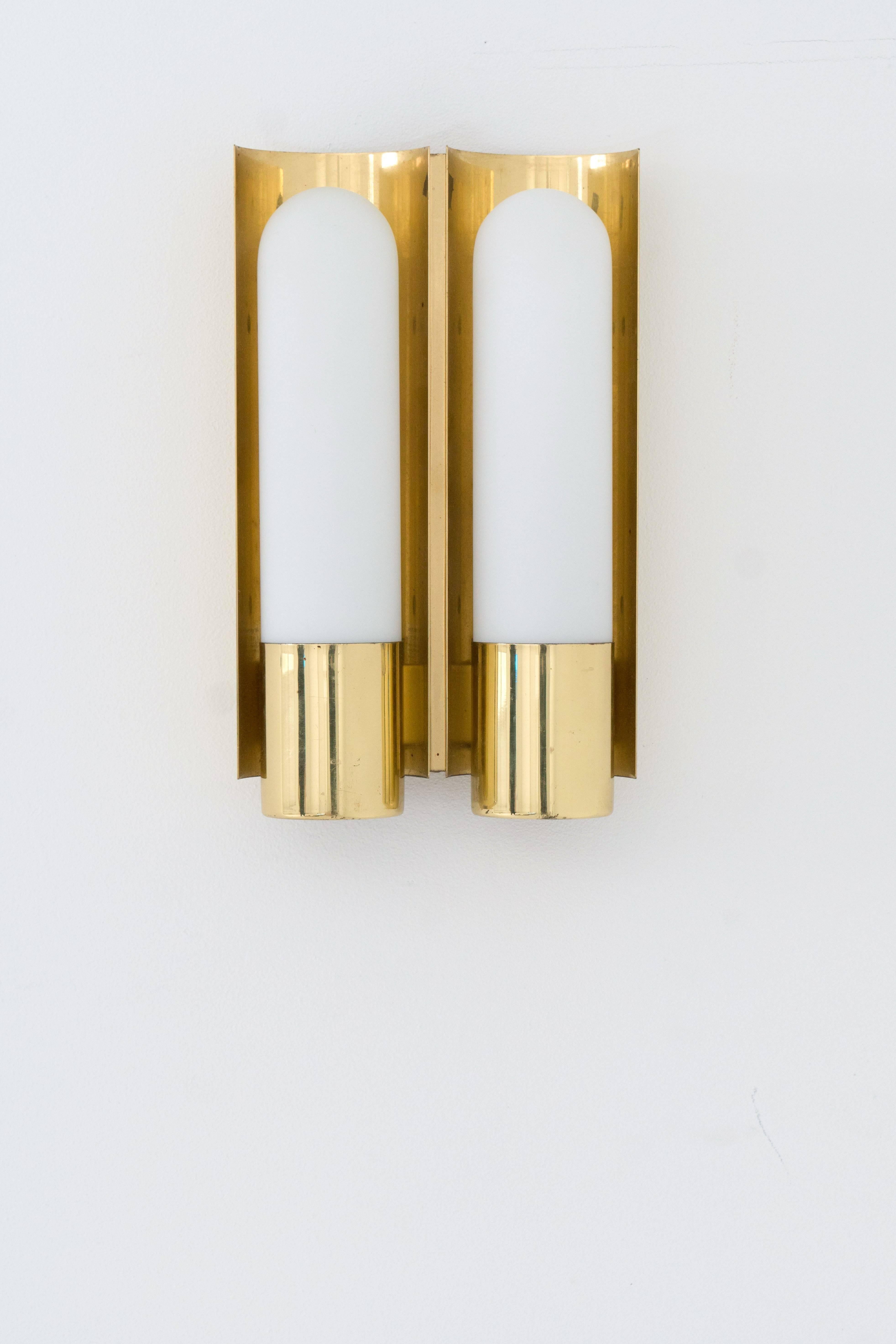 Very heavy and substantial brass double wall sconce. 