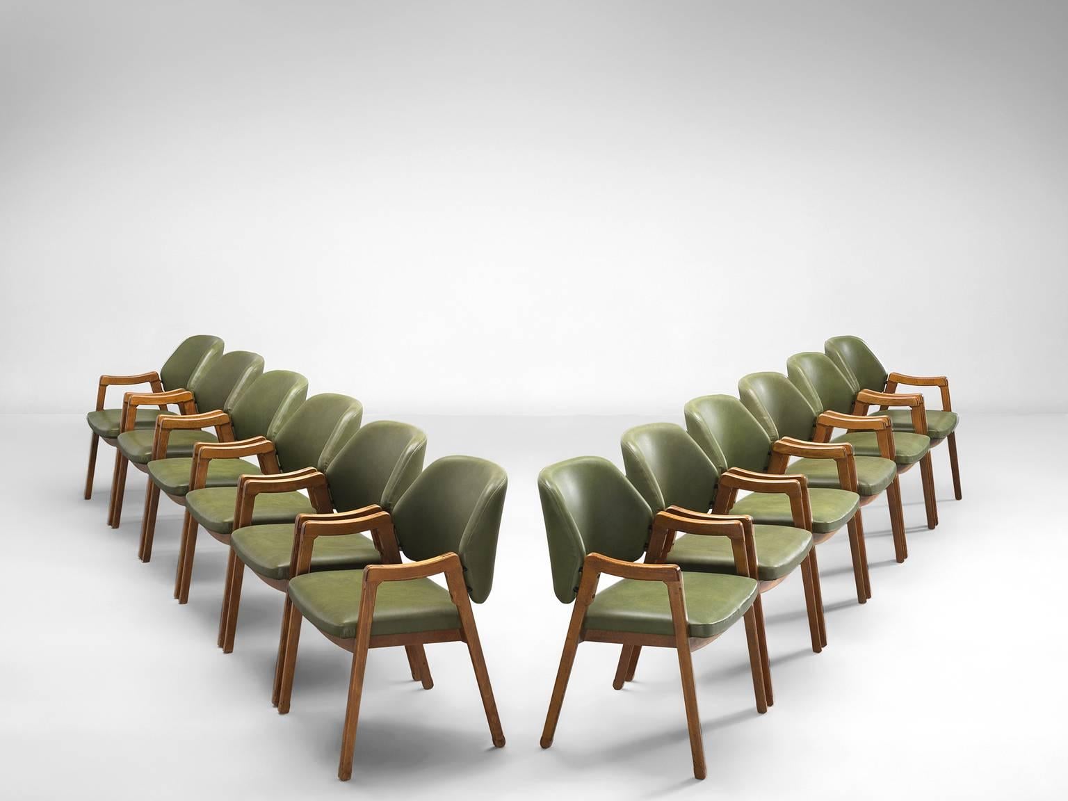 Six armchairs by Ico Parisi for Cassina, beech and leatherette, Italy, 1963.

This large set of green conference chairs '814' were are executed to perfection and provide great comfort. These chairs look almost sculpted thanks to the exquisite