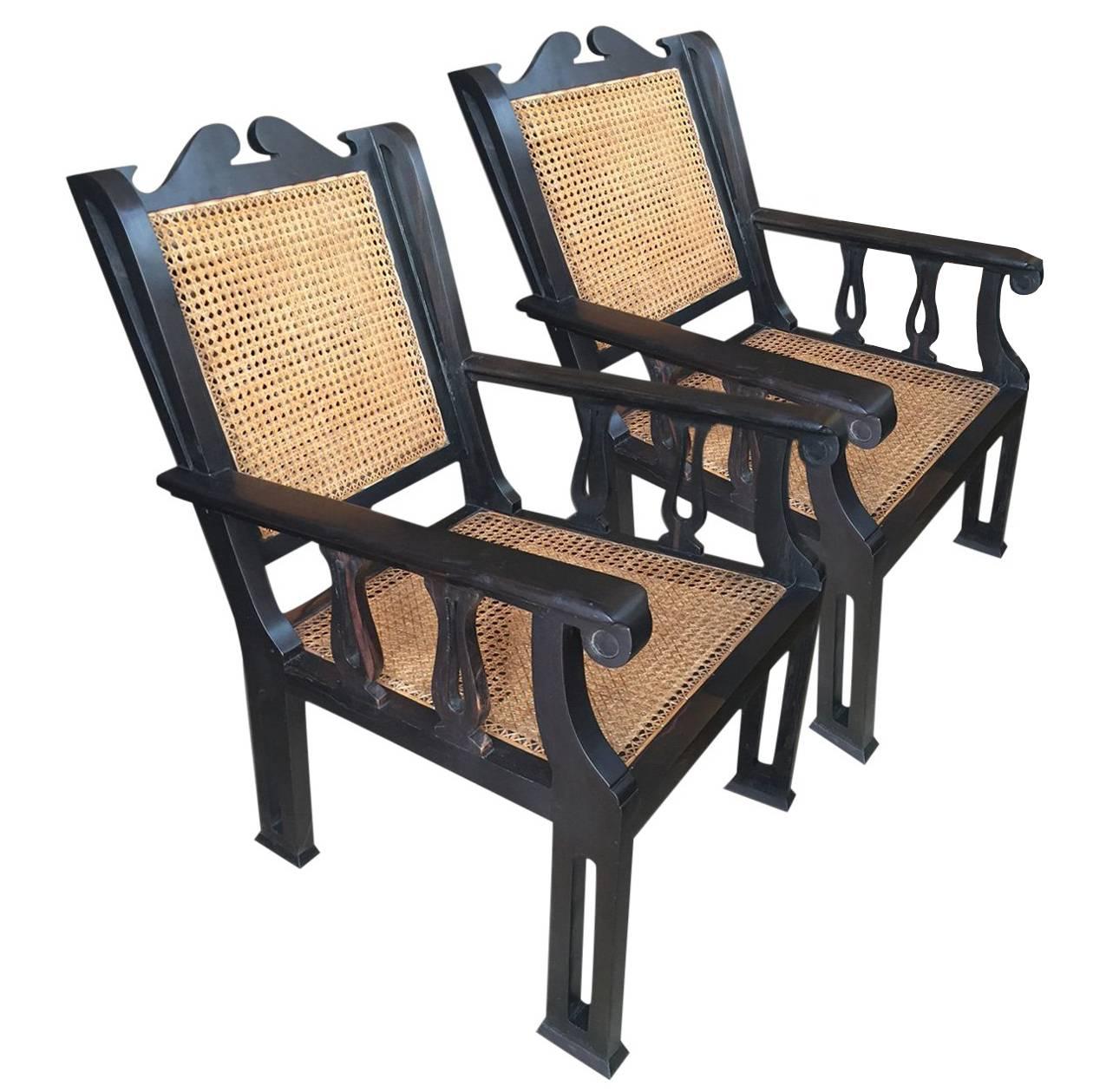Pair of Solid Ebony and Cane Anglo-Indian Armchairs For Sale