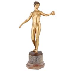 Art Nouveau bronze sculpture of a nude holding a ball by Hans Keck 1900