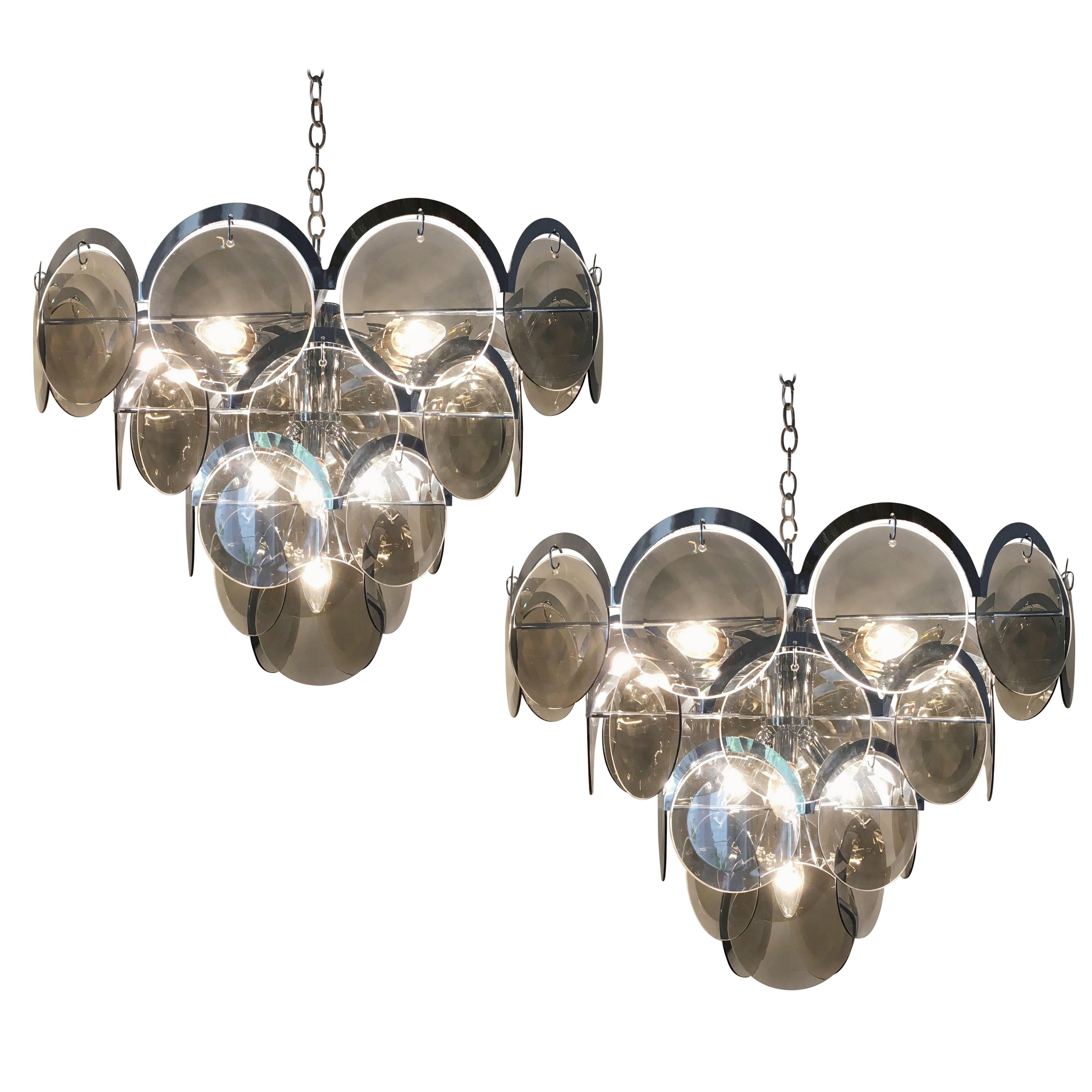 LAST ONE

These gorgeous chandeliers by Vistosi are in excellent condition and look incredibly glamorous whether lit or unlit. 

These offer substantial scale and create real visual impact with their 63cm diameter and 48cm frame height. When the