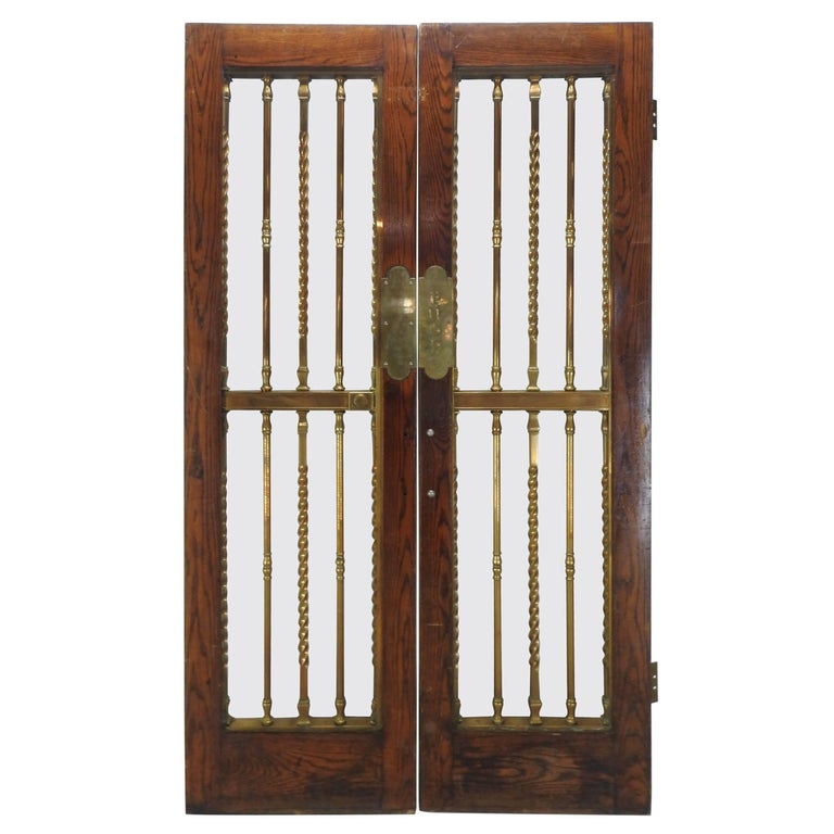 Pair Of Glass Paneled Oak Doors With Bronze Hardware At 1stdibs Pair Of Glass Paneled Oak Doors With Bronze Hardware For