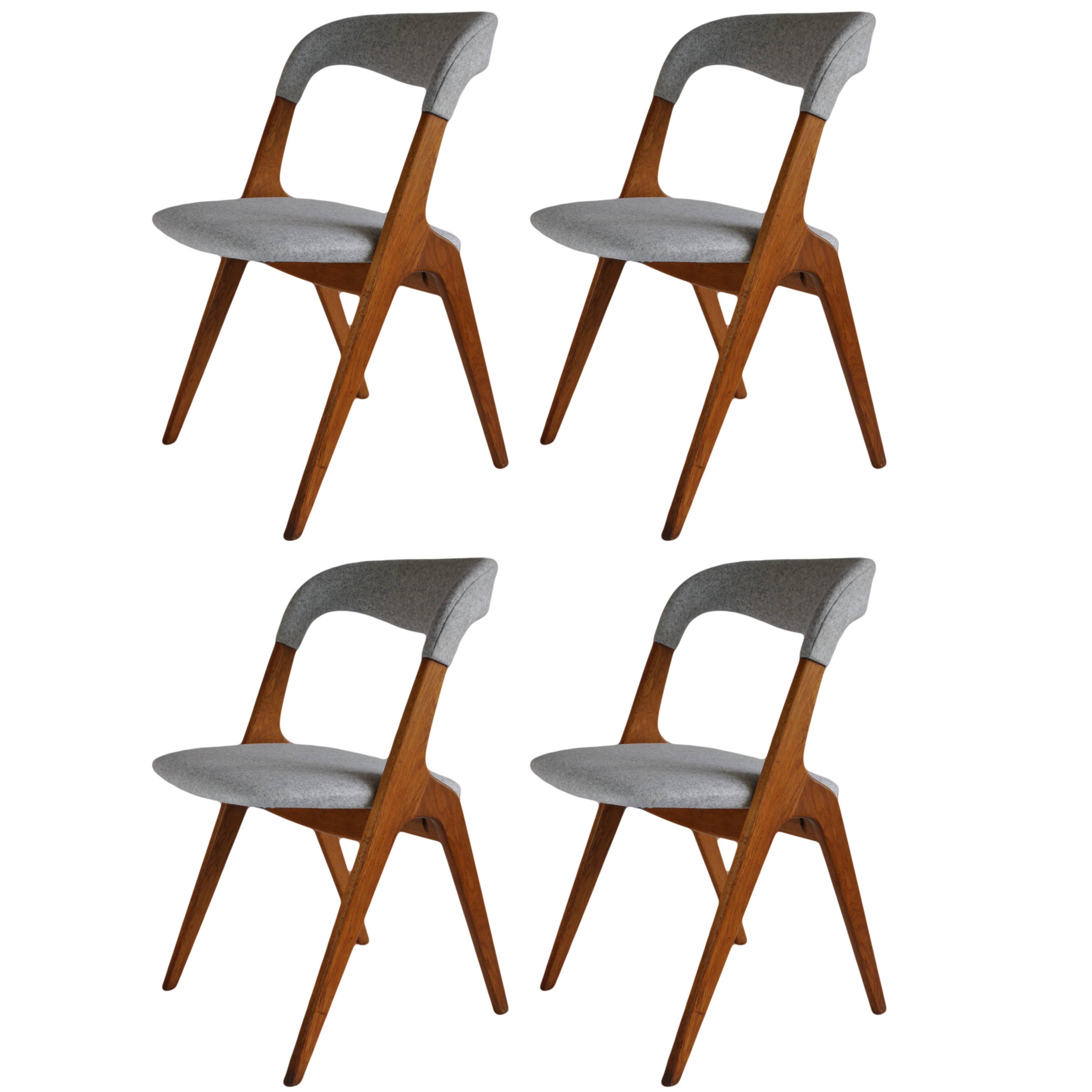 Johannes Andersen Dining chairs, set of 4. Fully Restored.